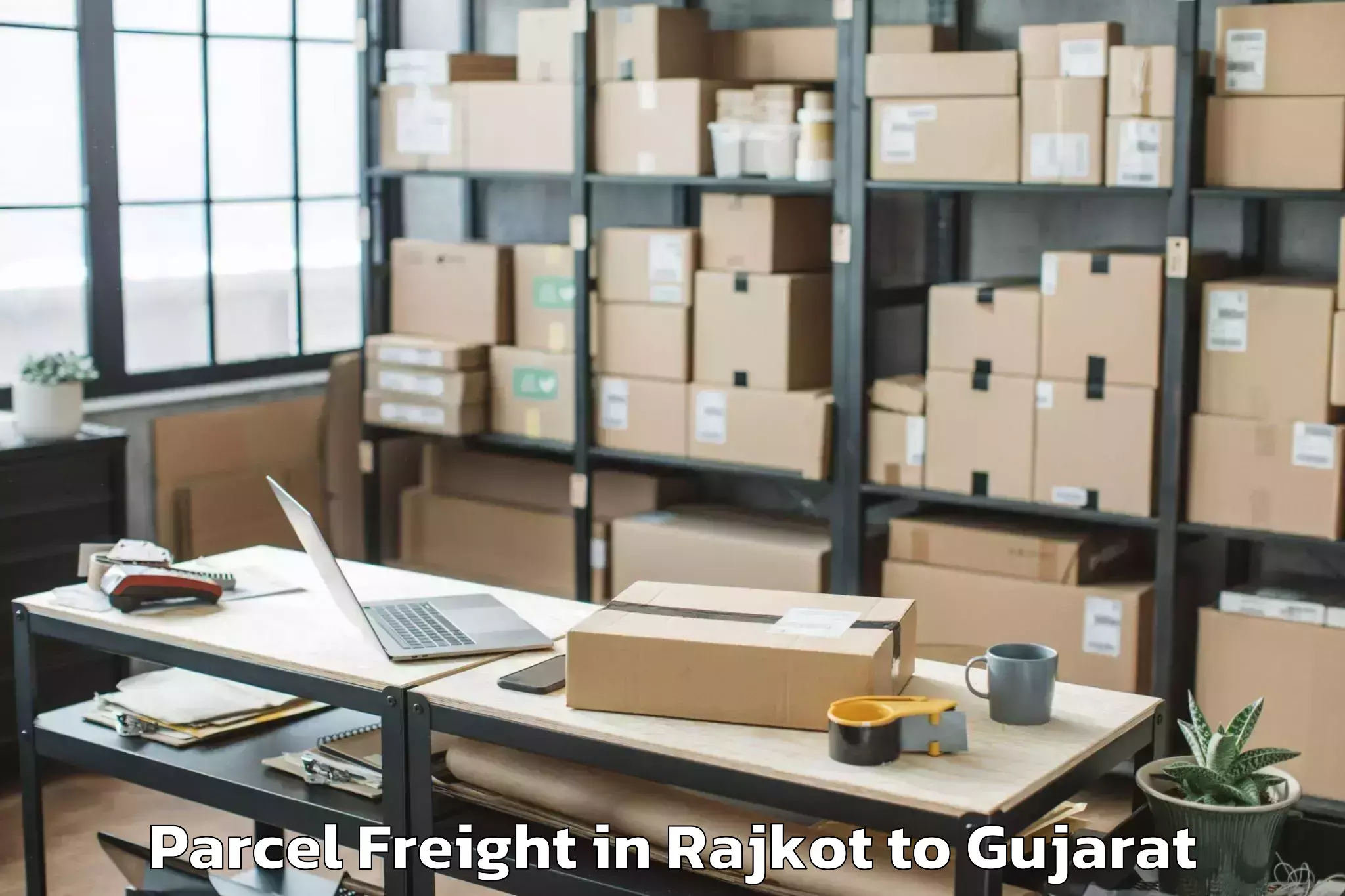 Professional Rajkot to Ganpat University Mehsana Parcel Freight